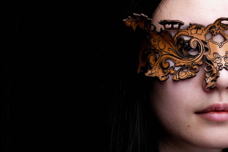 wanjun wearing seasons studios laser cut leather mask