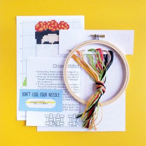 supplies inside the diy frida cross stitch kit pop shop america