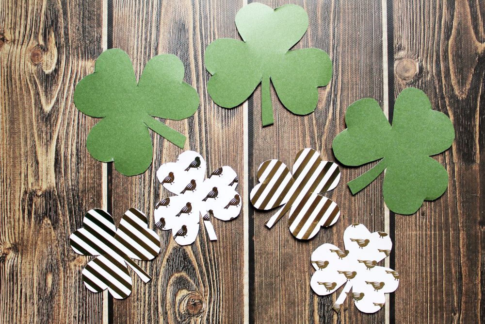 cut out shamrocks for diy st patricks day garland banner 1