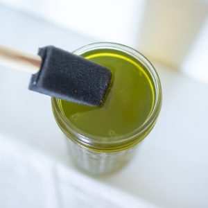 use-a-brush-to-apply-cyanotype-liquid-to-fabric_square