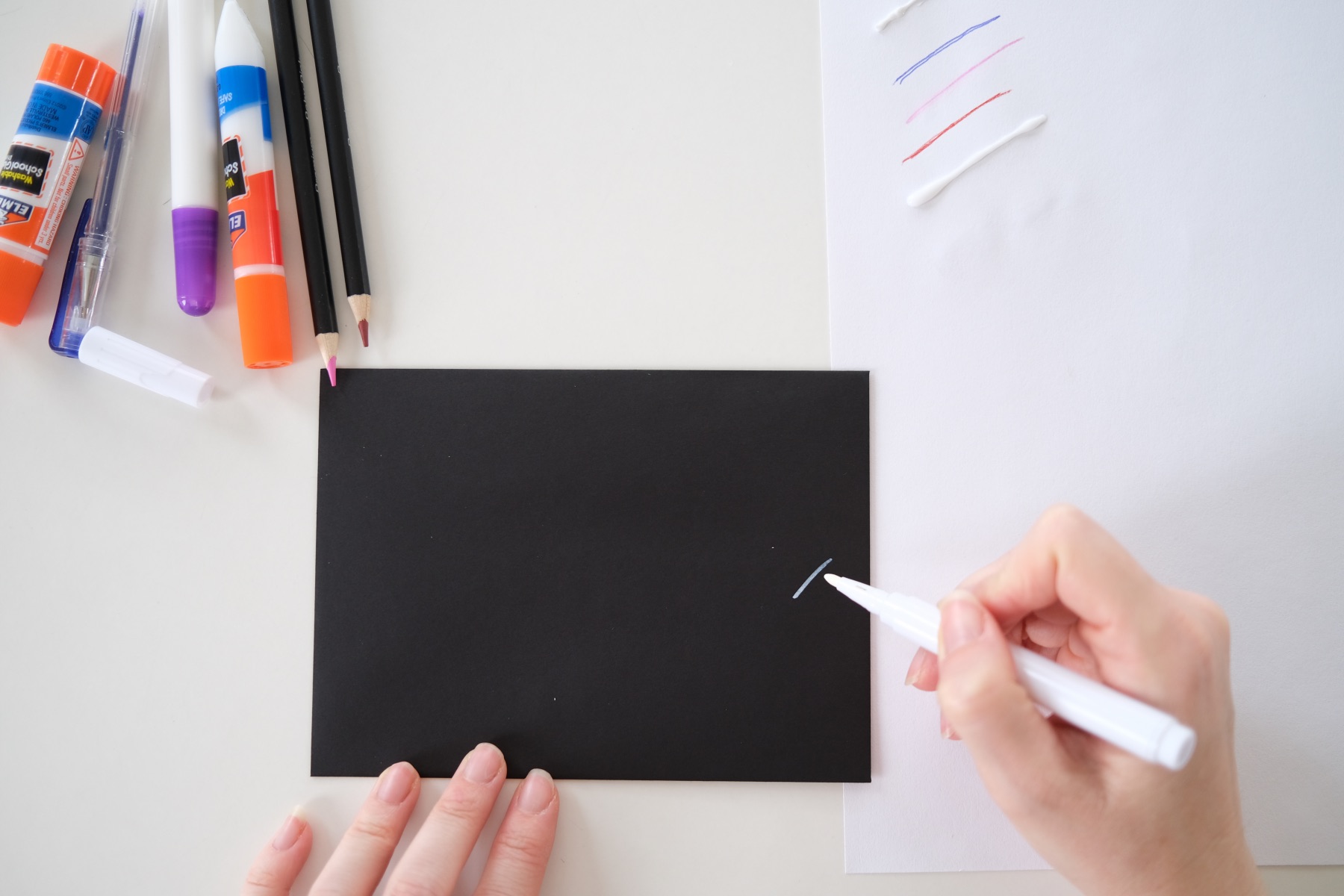 swatch pens on black cards