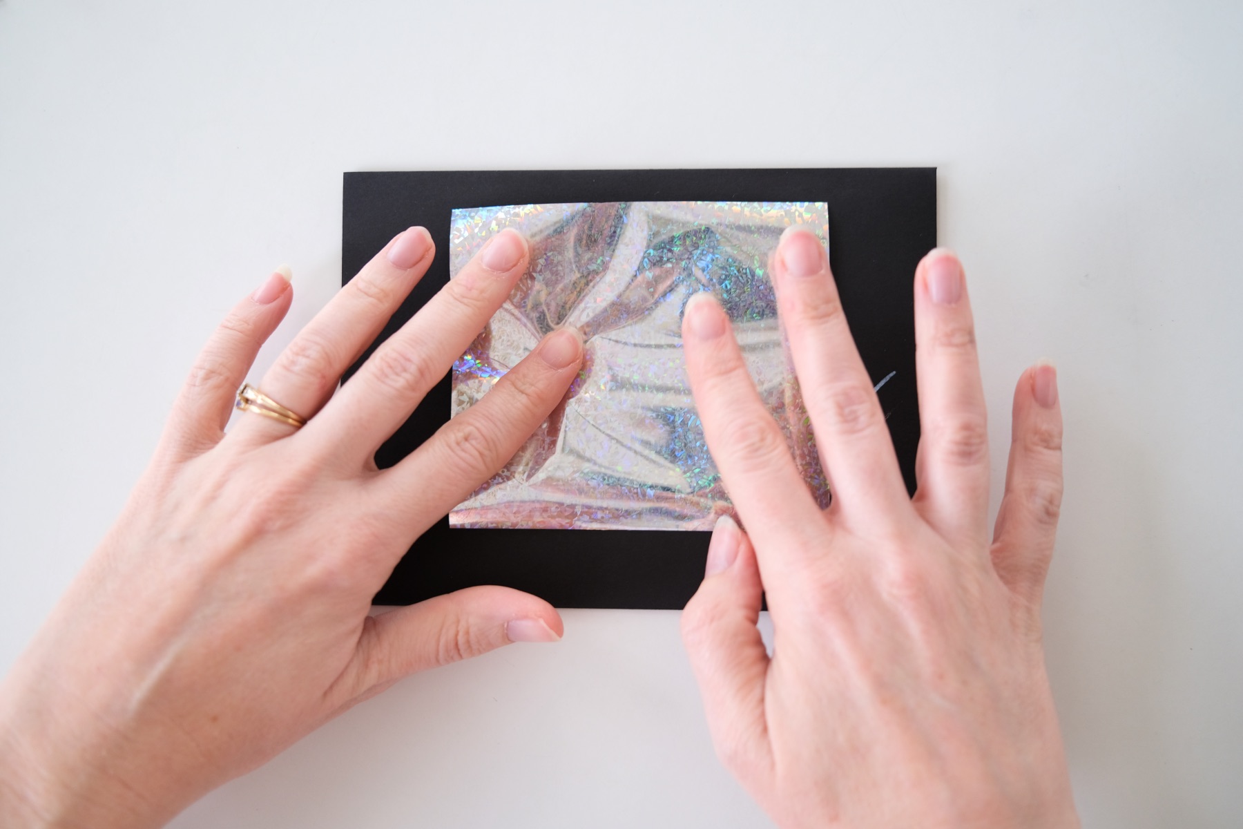 use your hands to burnish the image