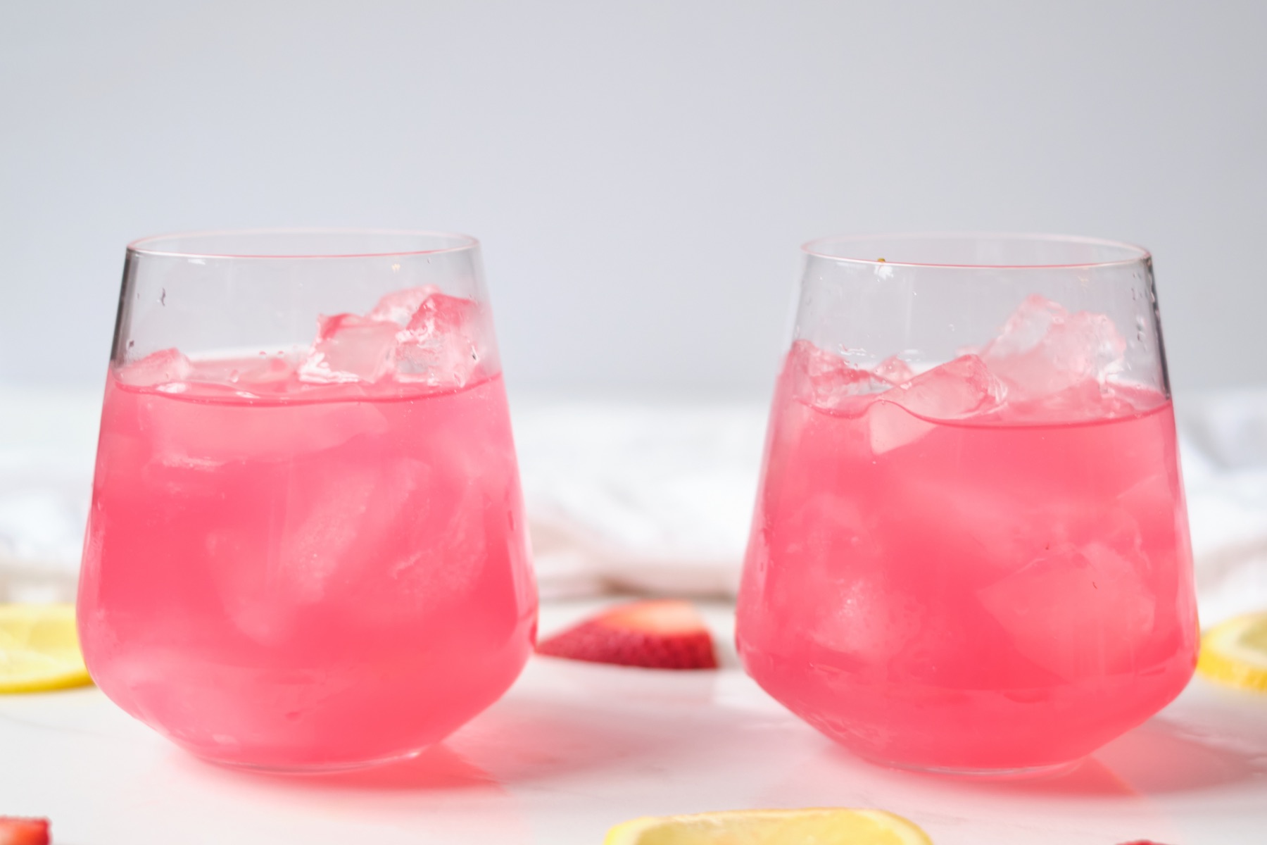 pour strawberry lemonade in a glass