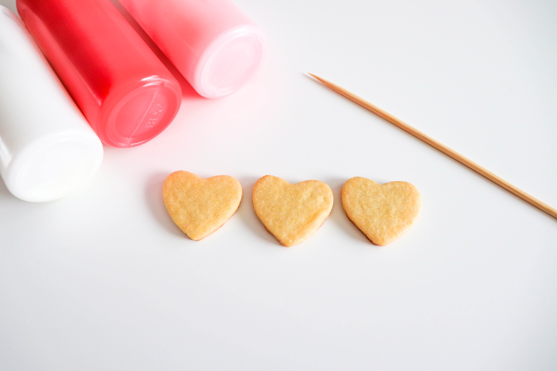 wooden skewer and tools to decorate sugar cookies