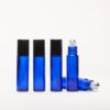 blue glass roller ball bottles pop shop america