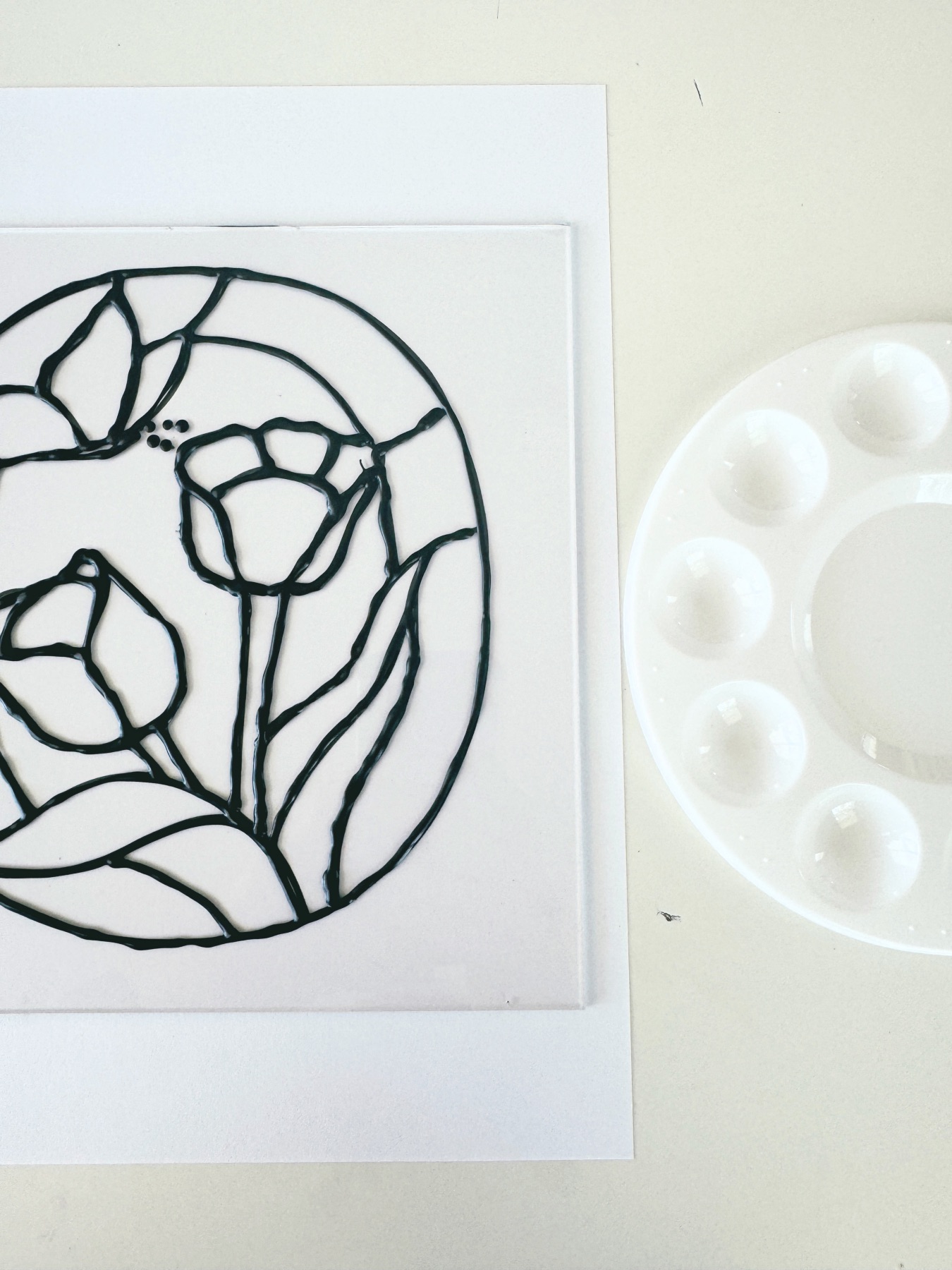 mix mod podge and food dye to make stained glass window fluid web