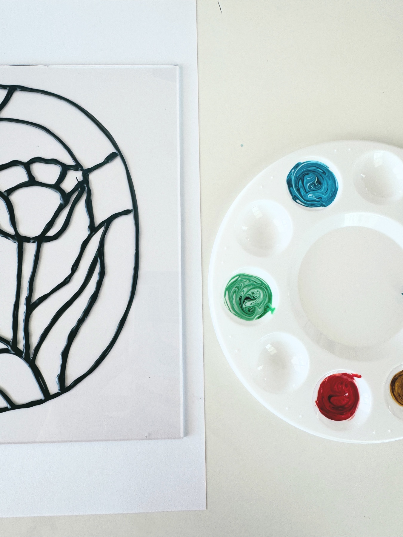 mix together food dye and mod podge web