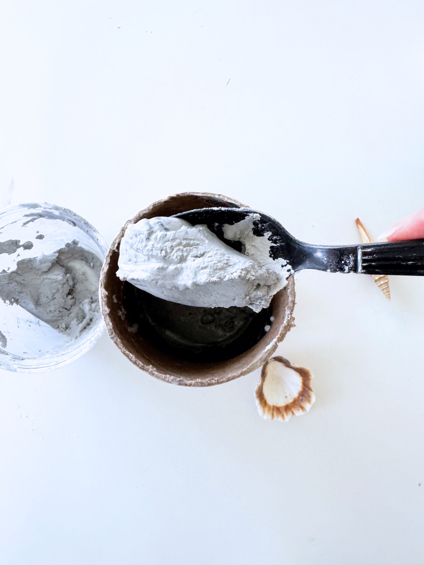 scoop concrete into the mold web