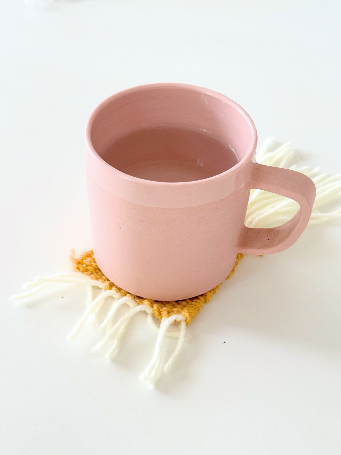 finished woven coaster with no fringe web