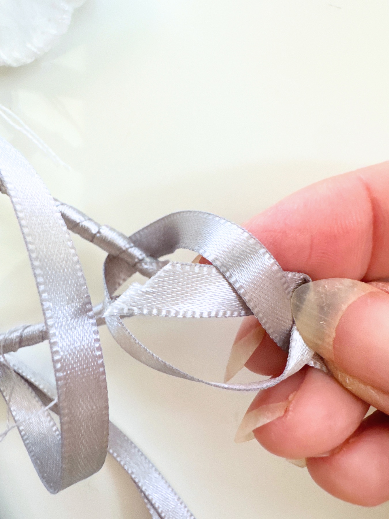 attach a ribbon to hang the mobile web